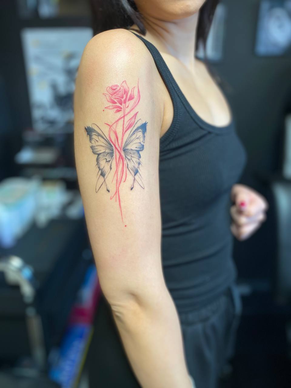 Pomegranate script tattoo in red ink